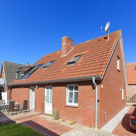 Ferienwohnungen Im Haus Meeresleuchten Neuharlingersiel Esterno foto